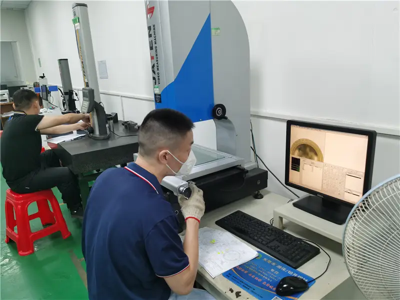 Measuring a precision machined part with a height gauge